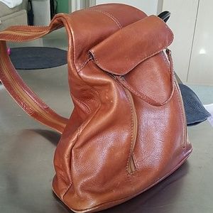 Vintage cognac leather back pack/ zipper purse